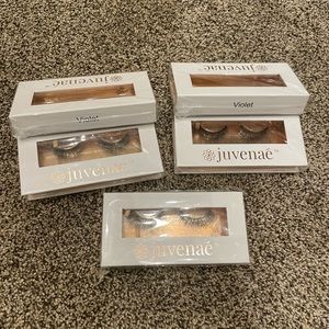 COPY - Violet Juvenae brand eye lashes with five in group.  Along with two blac…